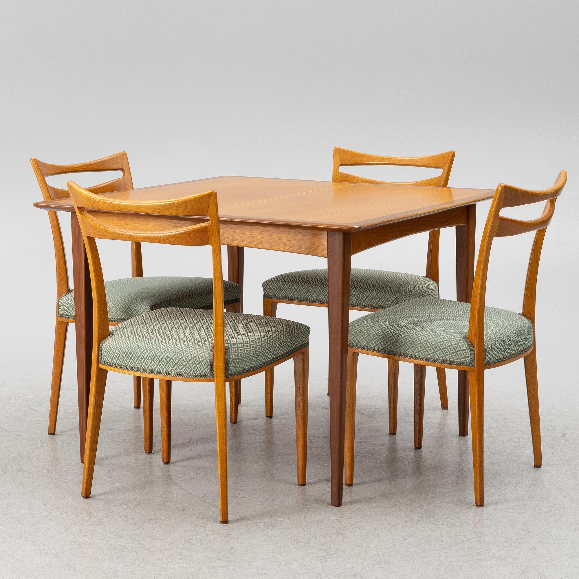 A dining table and four chairs, 1950s-60s.