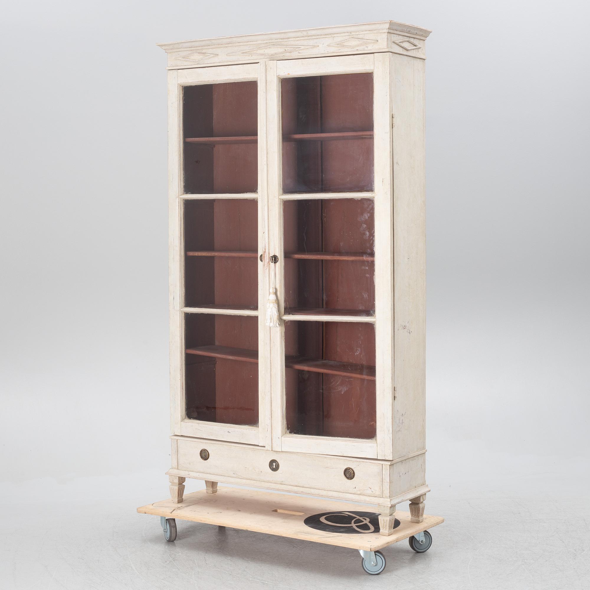 A Gustavian style display cabinet, circa 1900.