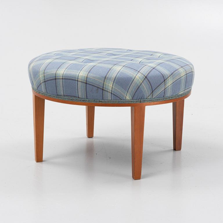 Josef Frank, a model 647 cherry wood stool by Firma Svenskt Tenn.
