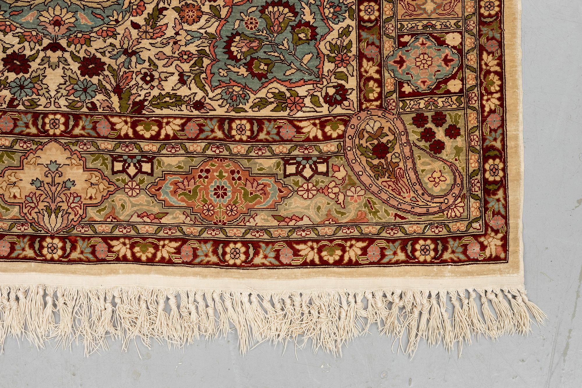 A rug, Old silk Hereke, ca 152 x 110 cm.