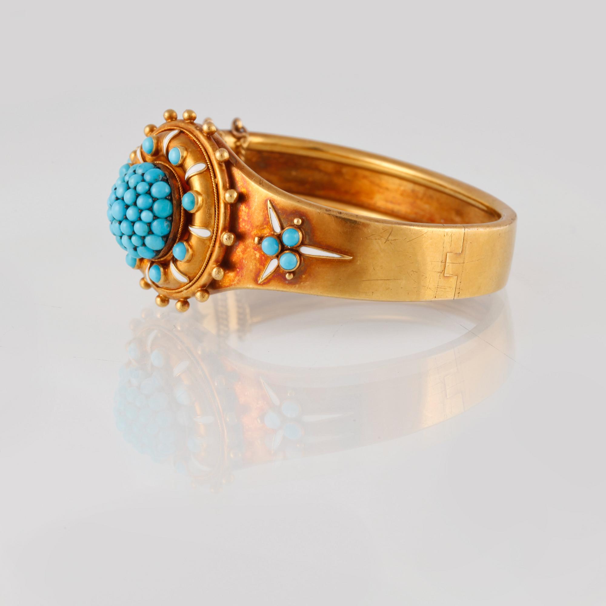 ARMBAND, 14K guld med turkoser och vit emalj. Vikt 28,8 gram.