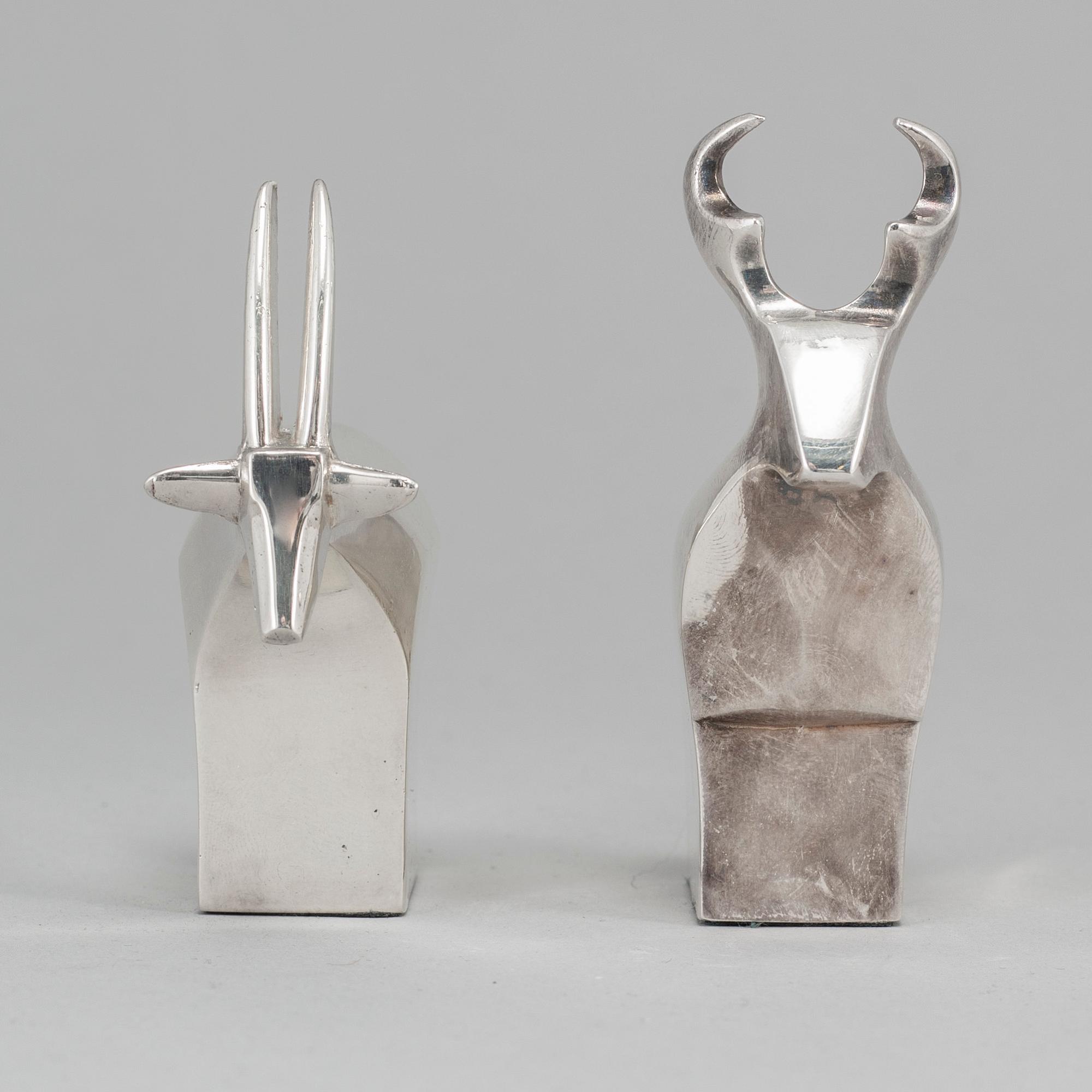 Two electro plated zinc figurines from Dansk Designs, Japan.