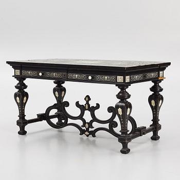 A Renaissance-style ebony, ebonized and ivory-inlaid library table, late 19th century, presumably Germany.
