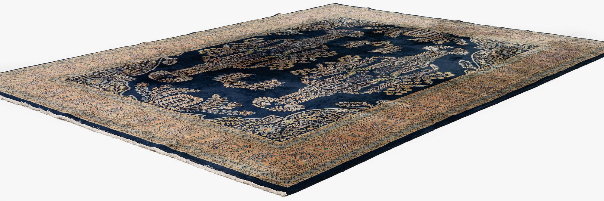 An India Carpet, c. 380 x 285 cm.