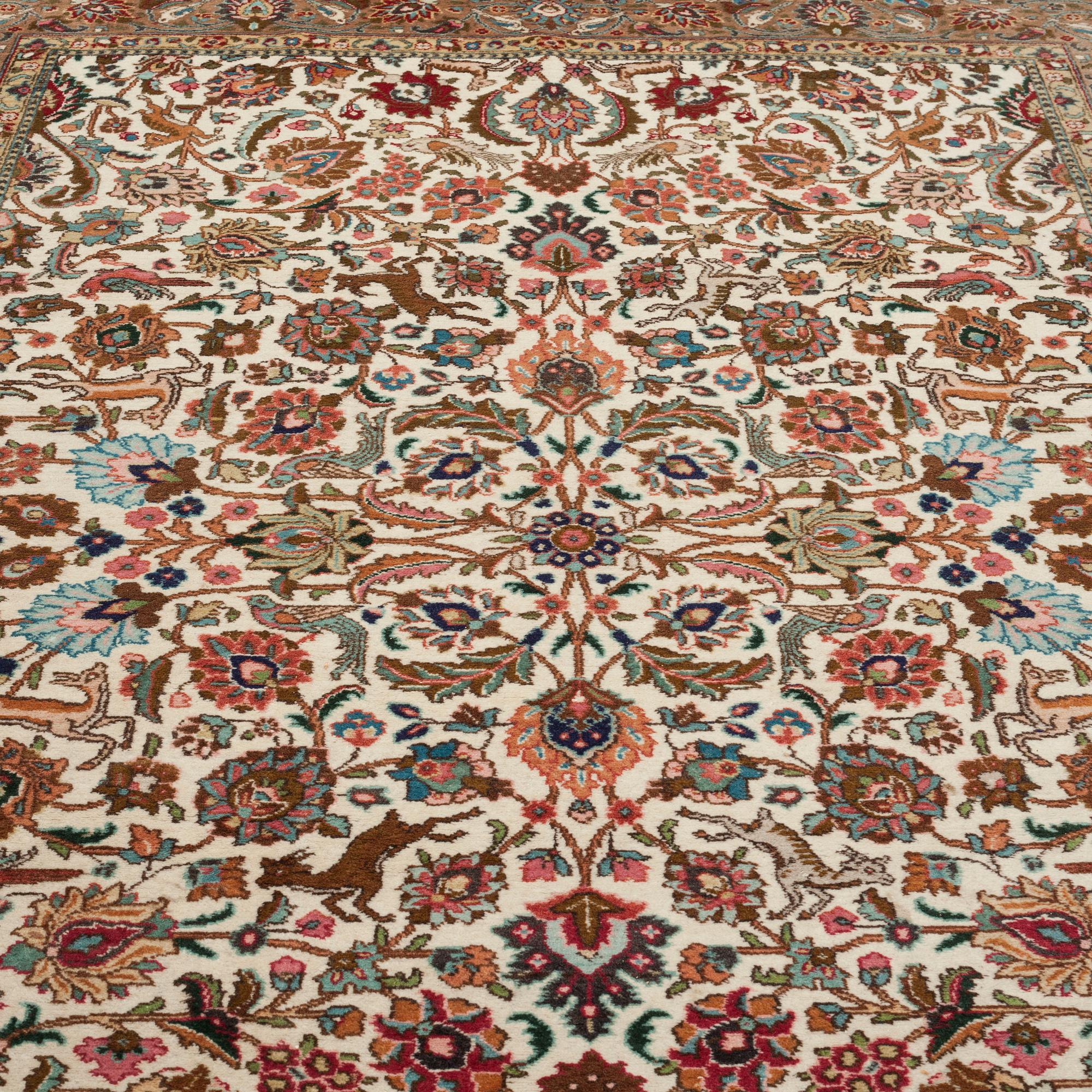 MATTO, a semi-antique Tabriz, ca 311 x 208 cm.