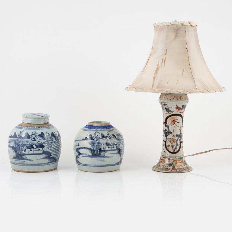 A Japanese vase made in to a lamp, and two Chinese blue and white jars, 19th Century.