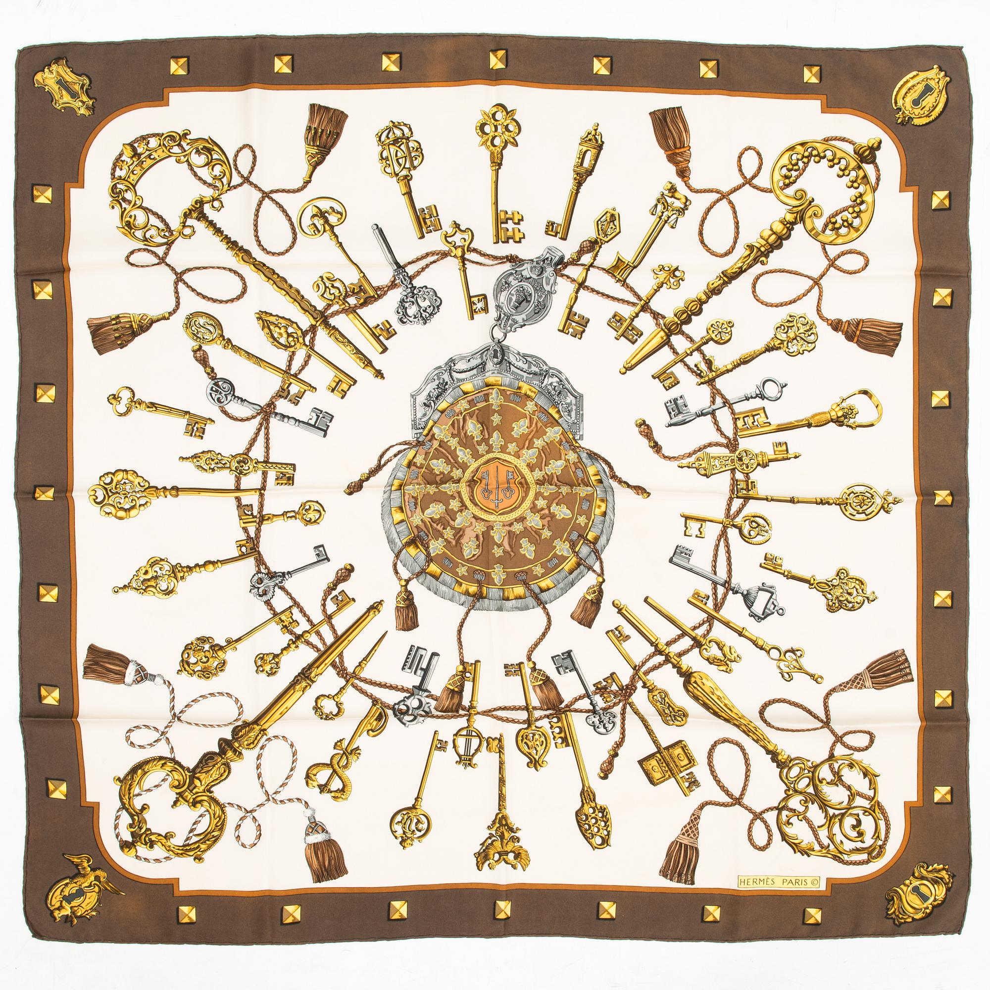 Hermès, Two silk scarves, 'Les Voitures a Transformation' and 'Les Clefs'.