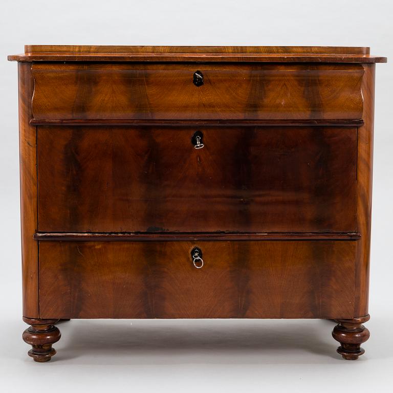 A Russian latter half of the 19th century chest of drawers in mahogany.