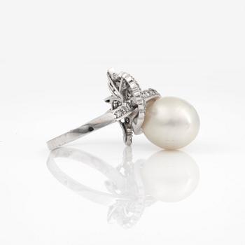 A cultured South Sea pearl and brilliant-cut diamond ring.