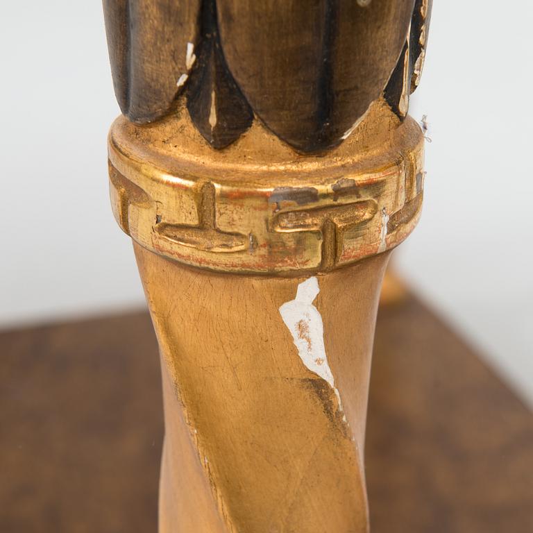 An early 20th century mirror with console table in late Gustavian style.