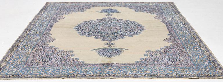 A semi-antique Kerman carpet, figural, c. 371 x 285 cm.