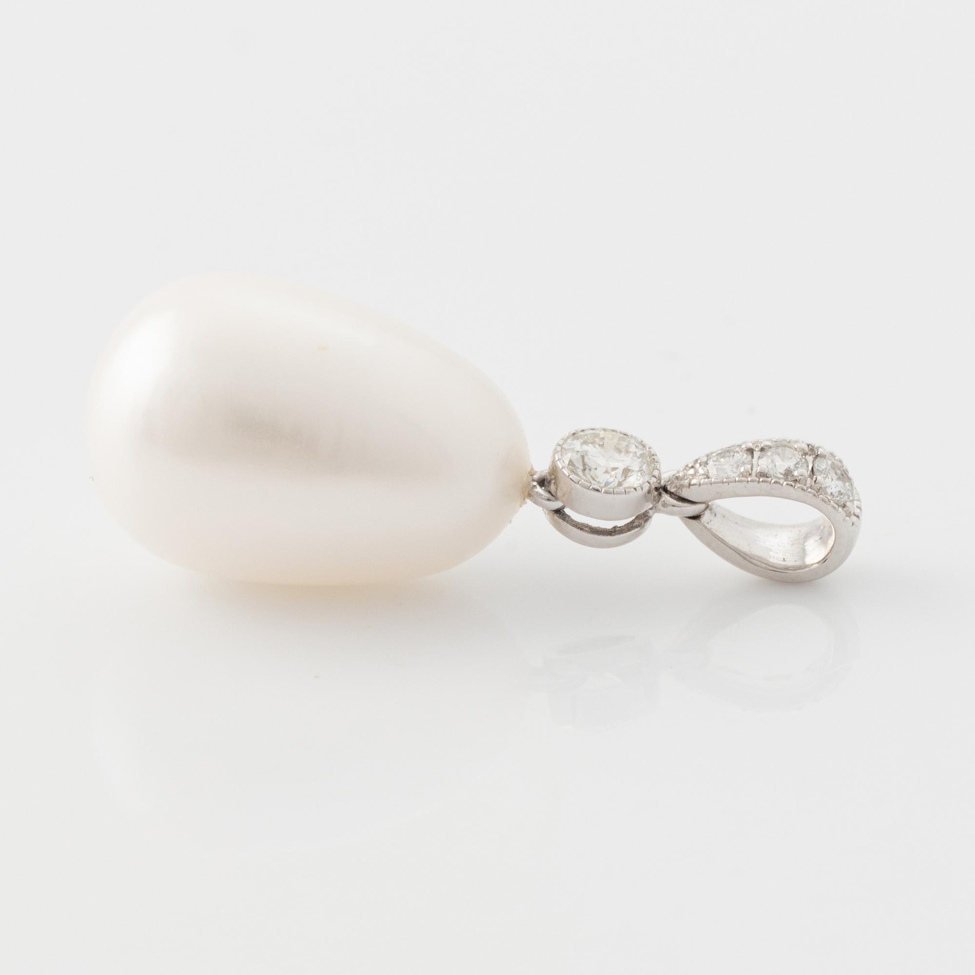 White gold pear shaped cultured pearl and brilliant cut diamond pendant.