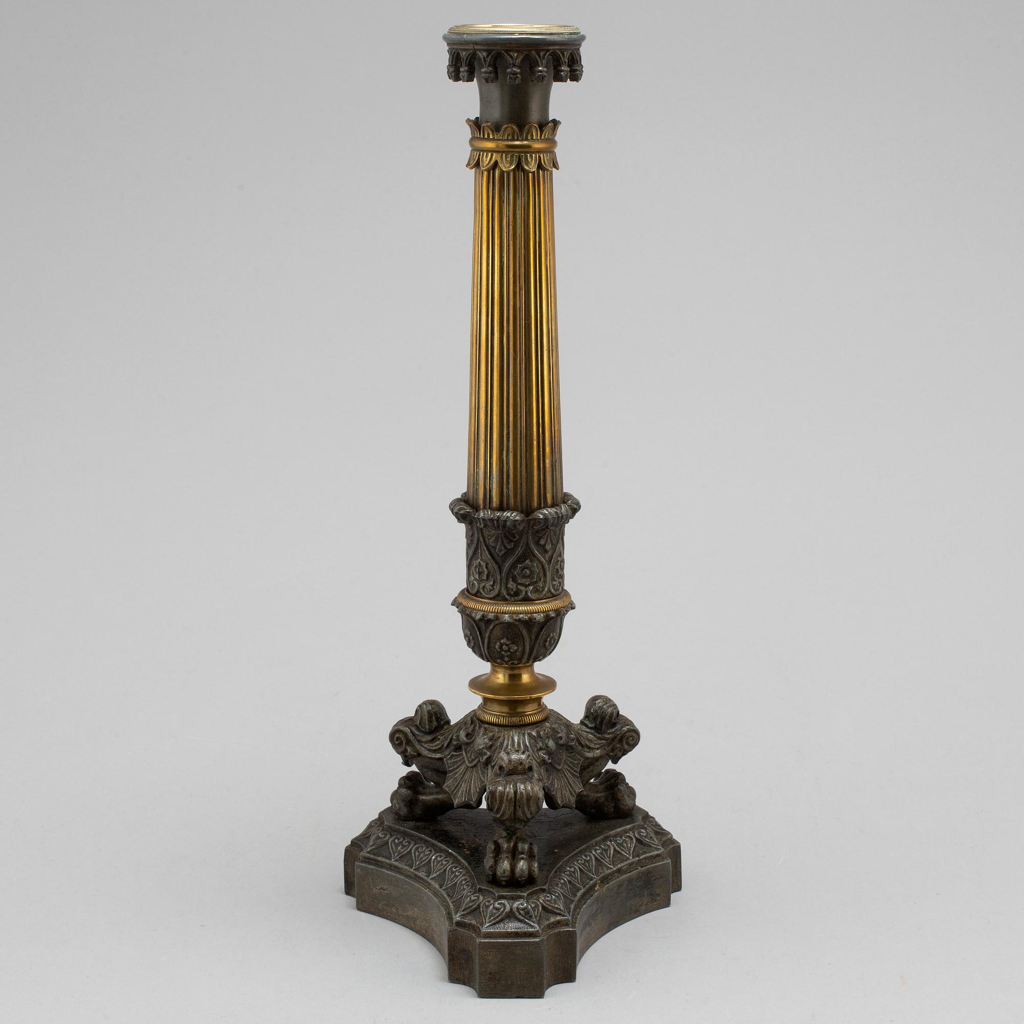 A mid 19th century late empire candlestick.