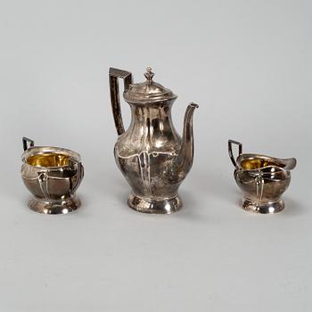 A silver coffee pot, creamer and a sugar bowl, Oulu, Finland 1921.