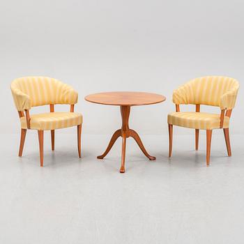 Carl Malmsten, a pair of 'Lata Greven' easy chairs, OH Sjögren, and a 'Berg' table, second half of the 20th Century.