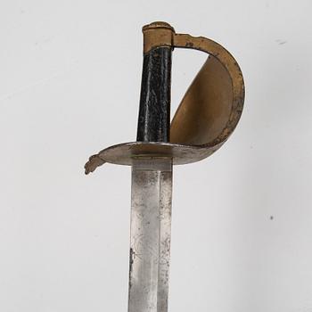 A Imperial German Navy cutlass with scabbard.