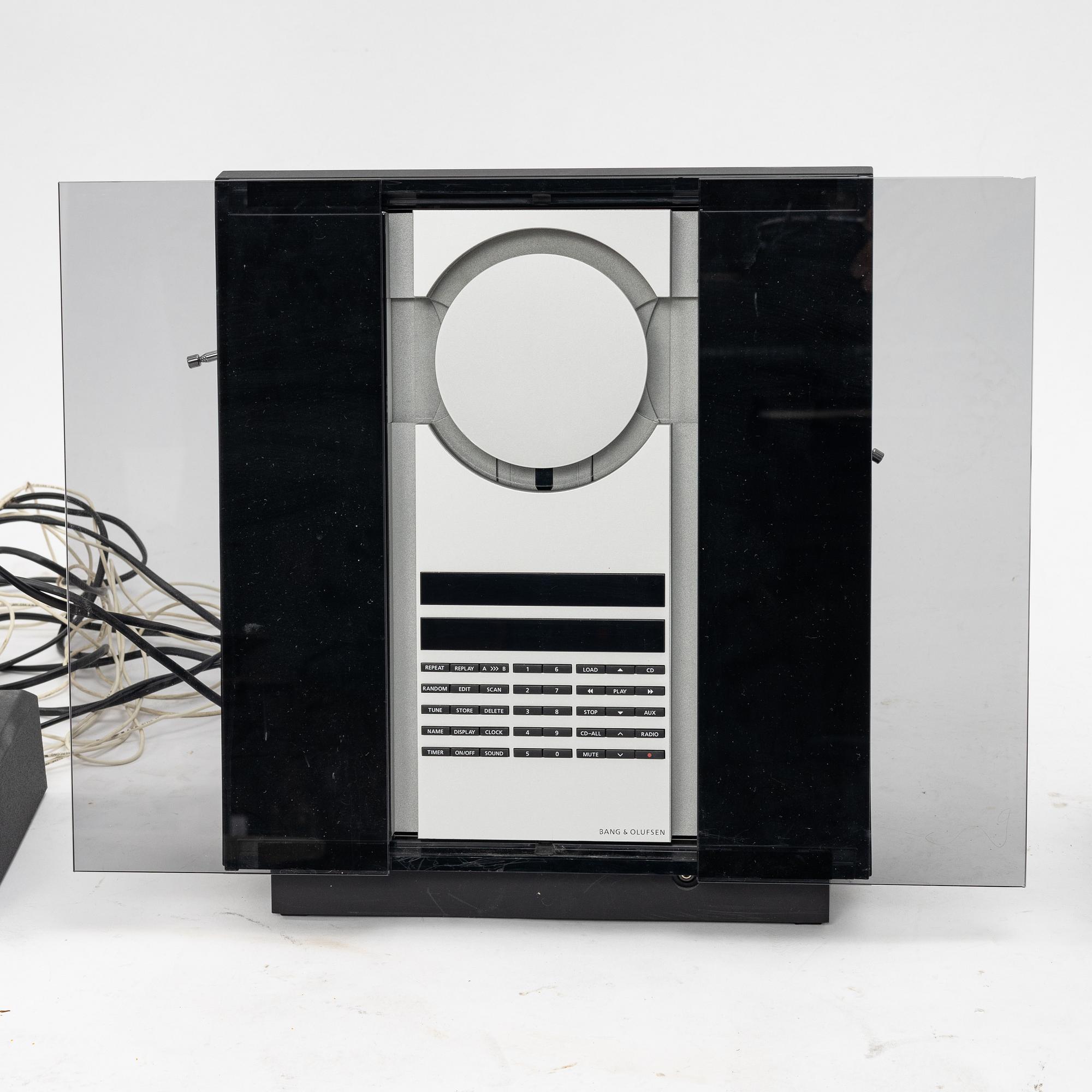 Bang & Olyfsen, a stereo and two speakers BeoSound 3000.