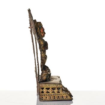 Gudom, förgylld kopparplåt med inläggningar. Nepal, omkring 1900.