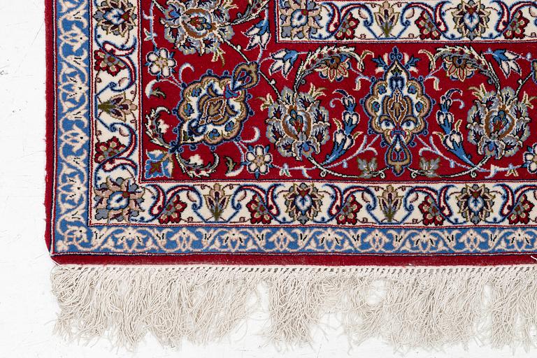 An oriental carpet, c. 310 x 200 cm.