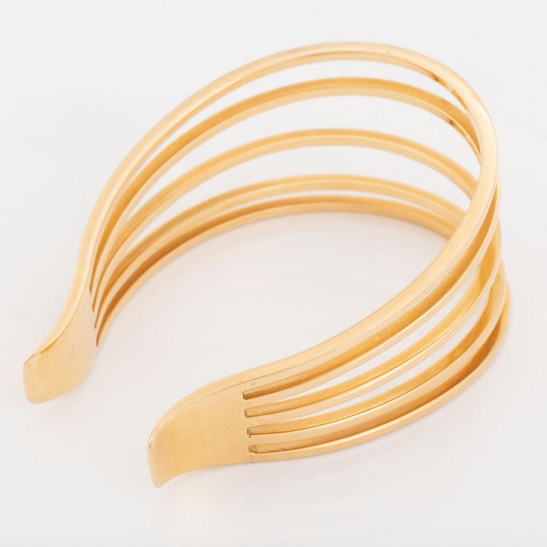 An 18K gold Sigurd Persson bracelet.