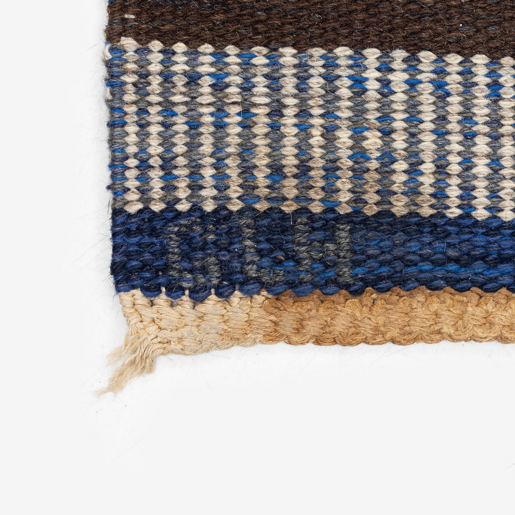 Margareta Grandin-Nettles, a flat weave carpet, c. 302 x 246 cm, signed GLH MG.