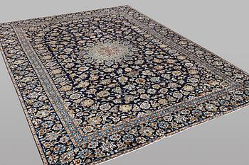 A carpet, Kashan, ca 391 x 286 cm.