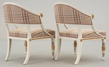 A pair of late Gustavian early 19th century armchairs.