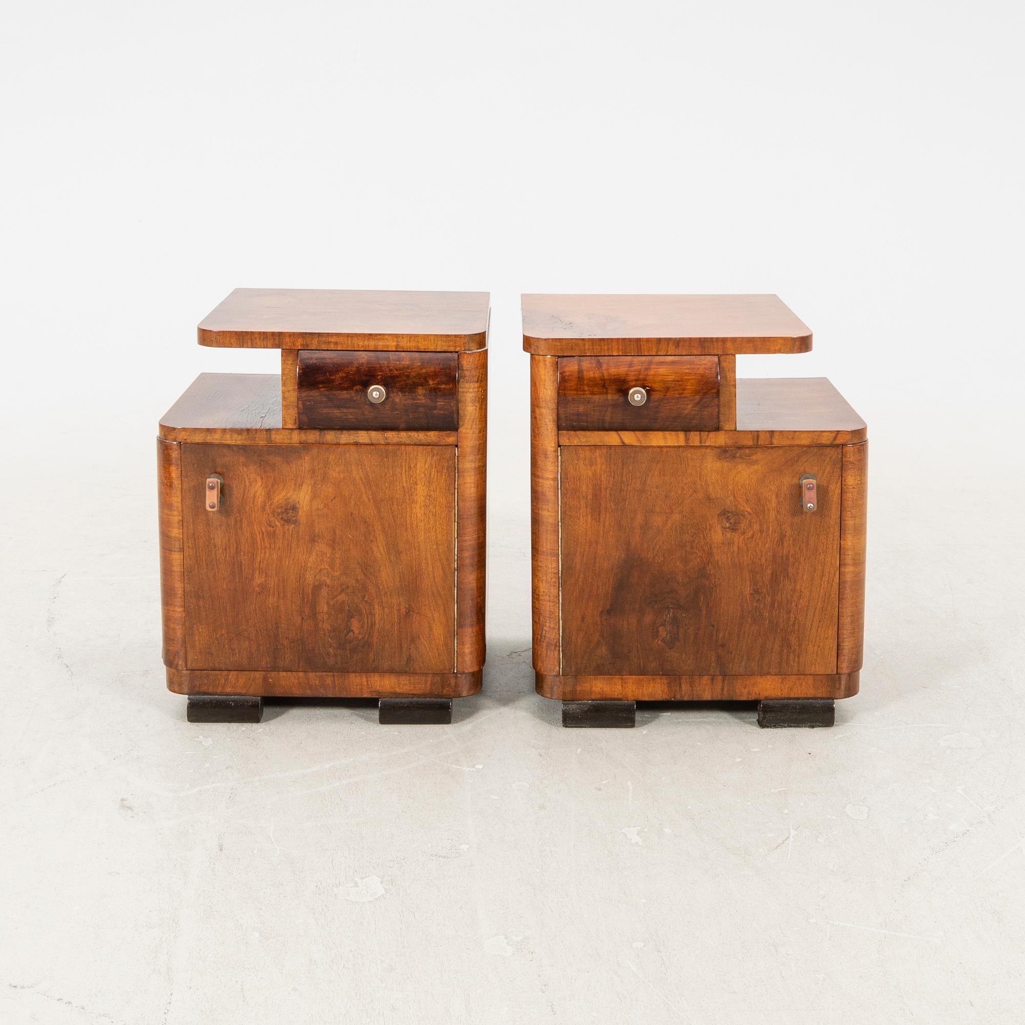A pair of Art deco walnut bedside tables.