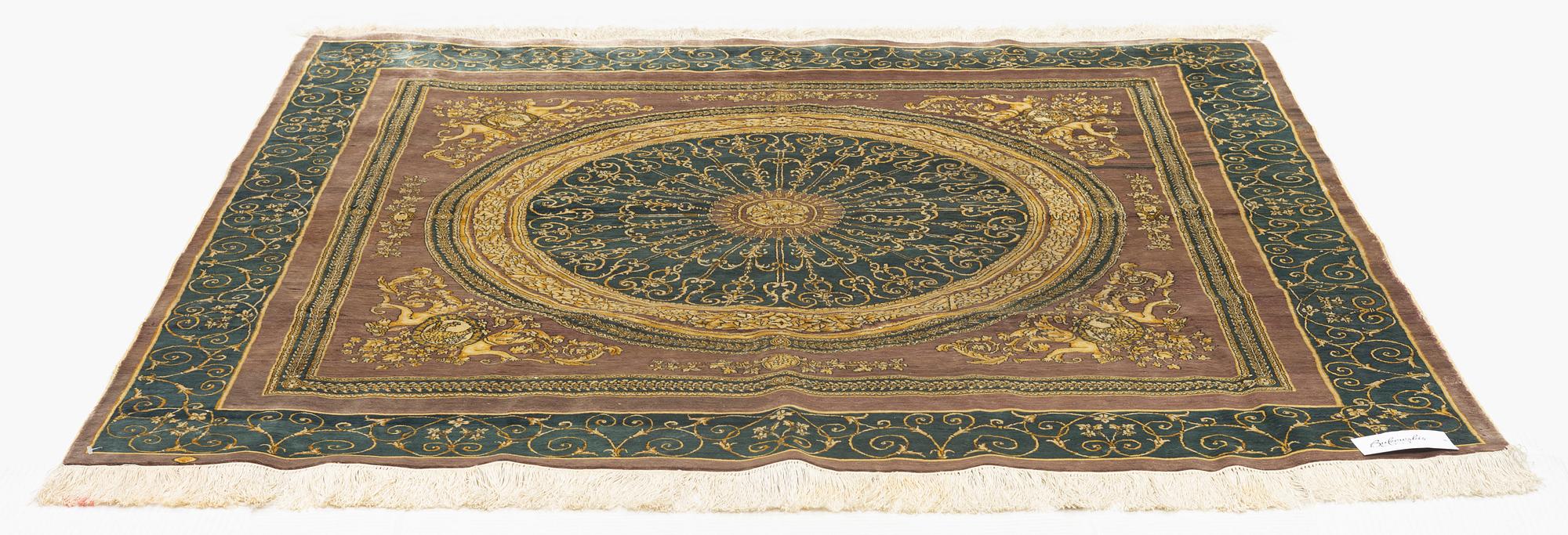 A silk rug, oriental, ca 163 x 166 cm.
