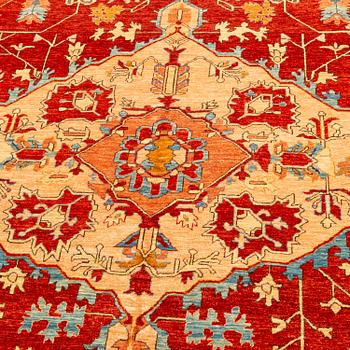 A serapi design carpet, 390 x 305 cm.