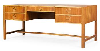 646. A Josef Frank mahogany desk by Svensk Tenn, the front with five drawers, the back with a bookshelf.
