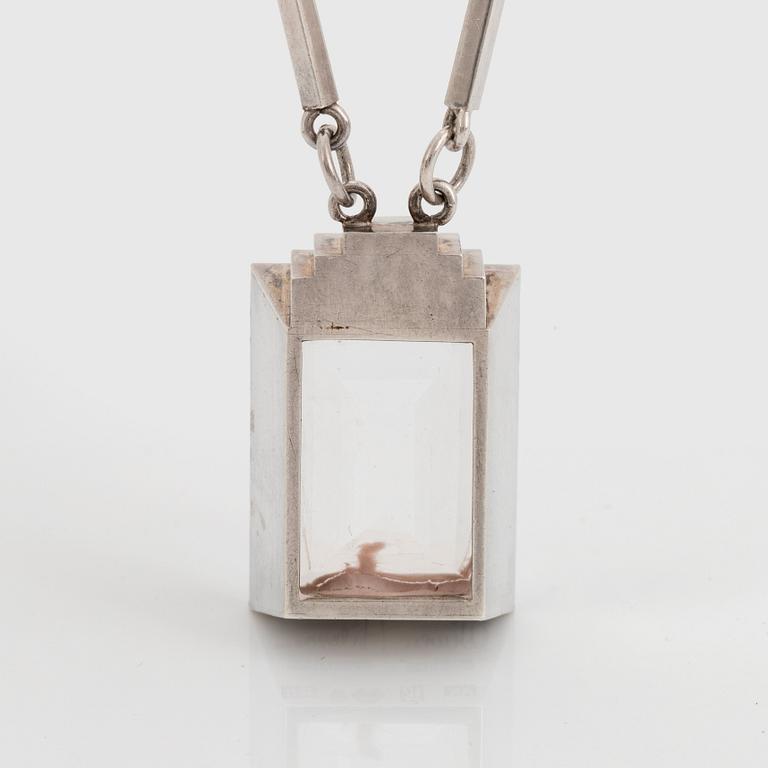 Wiwen Nilsson, a sterling silver necklace with a facet cut rock crystal pendant, Lund, Sweden 1943.