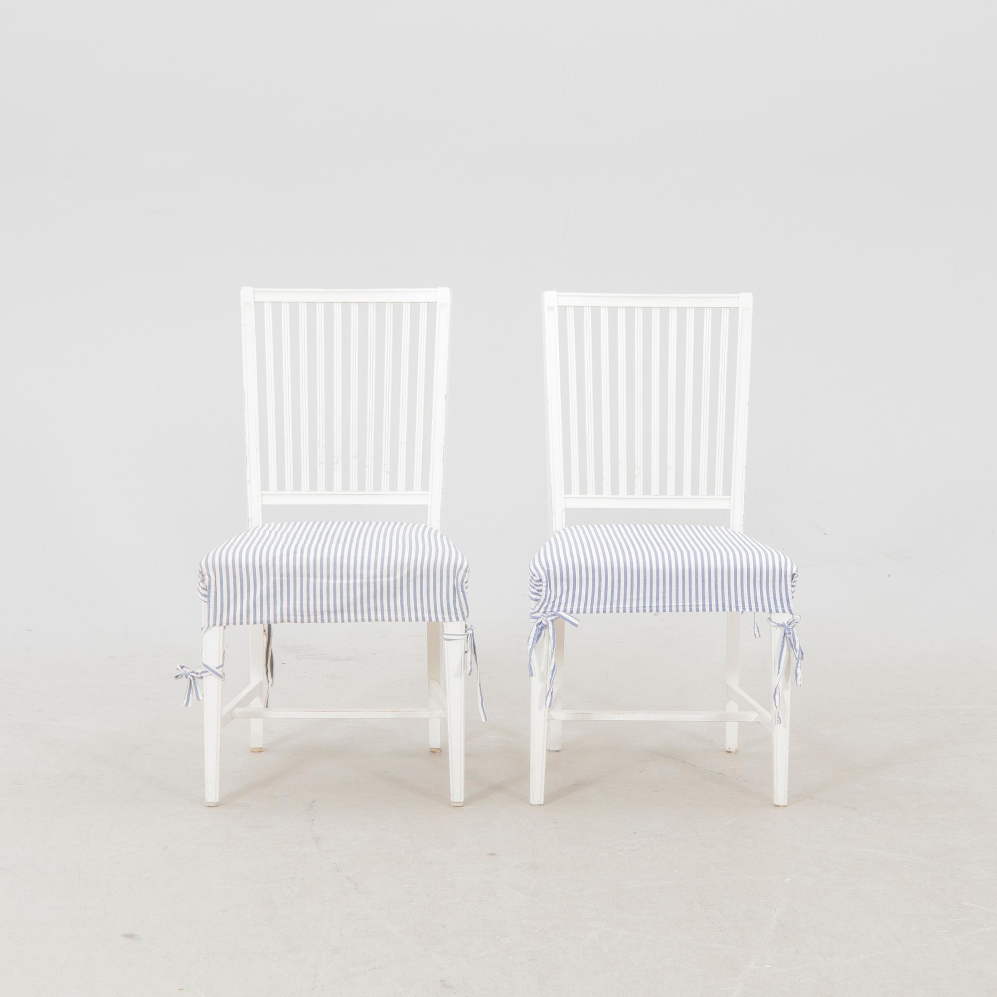 A set of 10 painted Gustavian style chairs from IKEA later part of the 20th century.