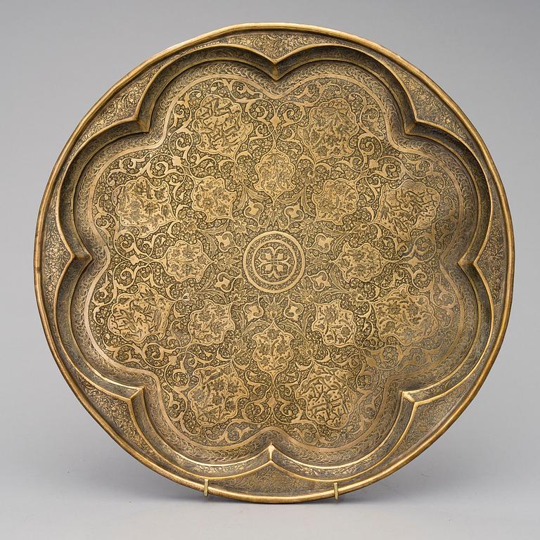 A Persian Qajar brass tray, circa 1900.