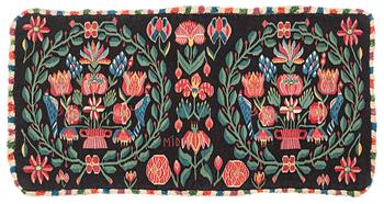312. A carrige cushion 'Blomsterurna och fåglar i krans', tapestry weave, Scania, c 98 x 50 cm, around the year 1800.