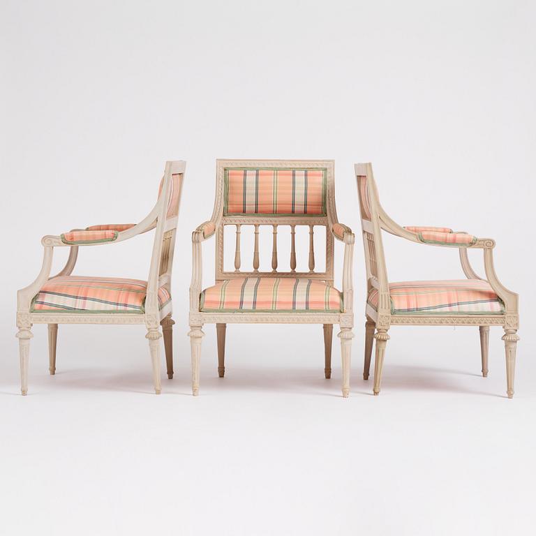A set of three late Gustavian open armchairs, late 18th century.