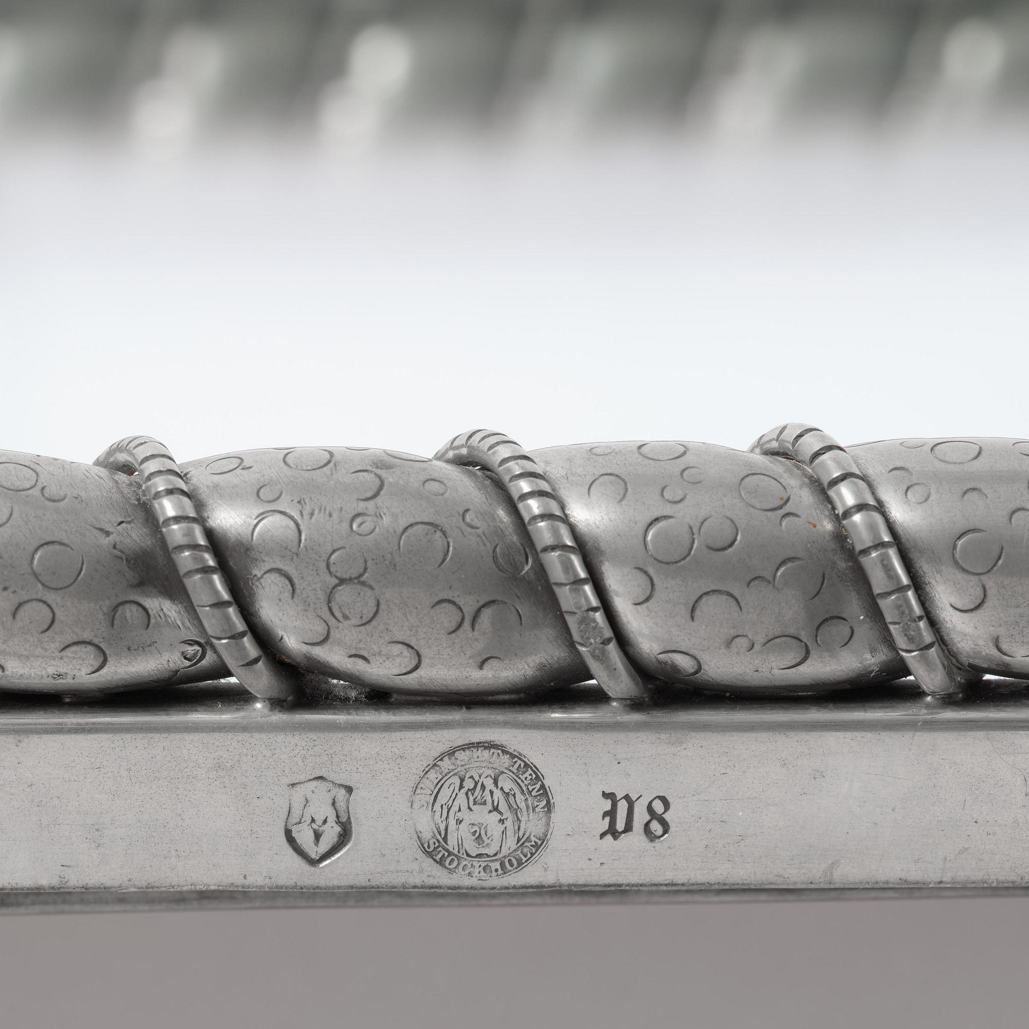 Estrid Ericson, a pewter framed mirror model "A 2518", Firma Svenskt Tenn, Stockholm, 1947.