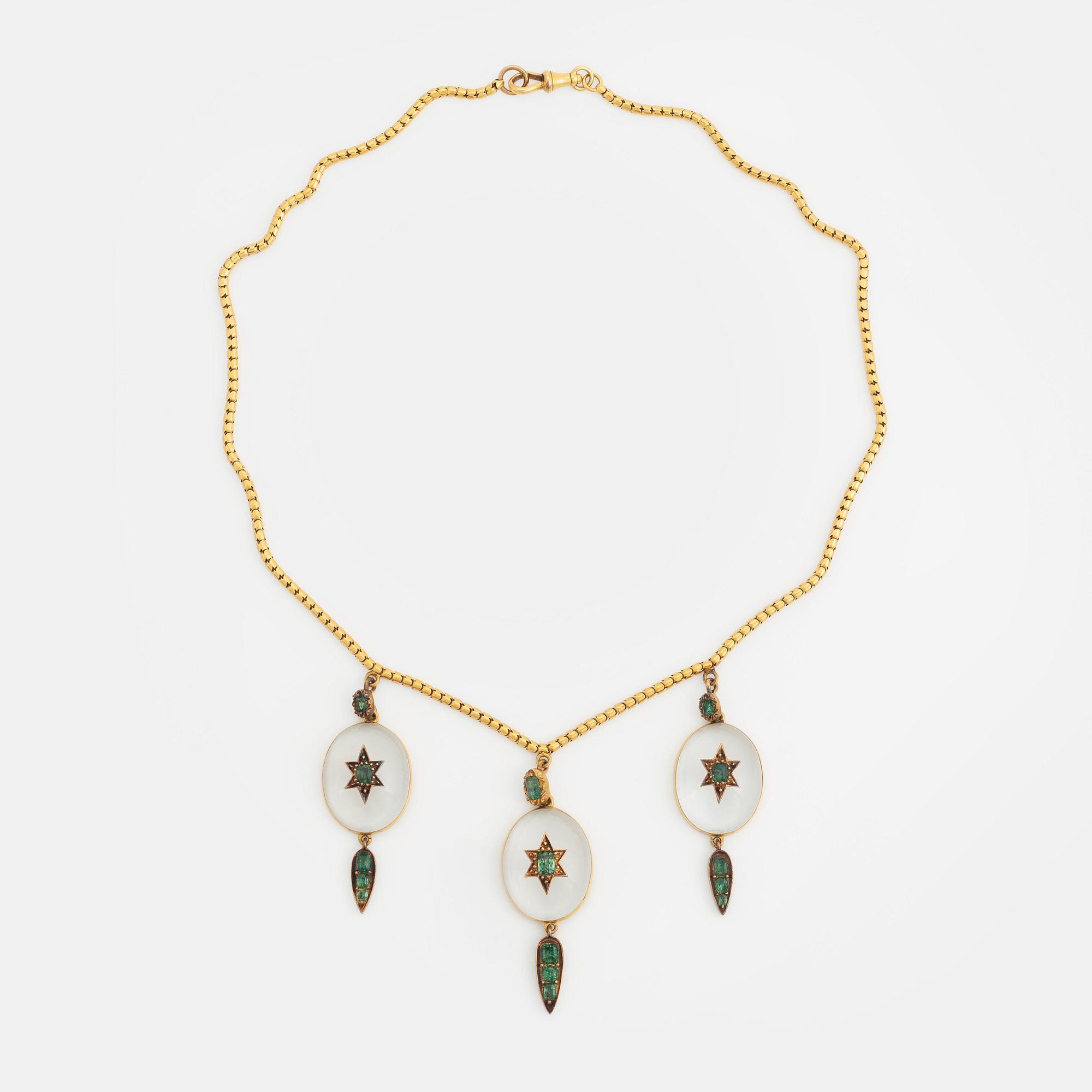 Collier 18K guld med bergkristall och gröna folierade stenar, möjligen smaragder.