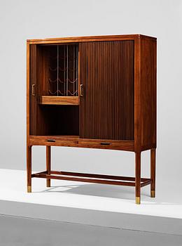 HANS J WEGNER, a bar cabinet executed by cabinetmaker Axel I Sørensen, for the Mayor's office, Aarhus City Hall,  1941.