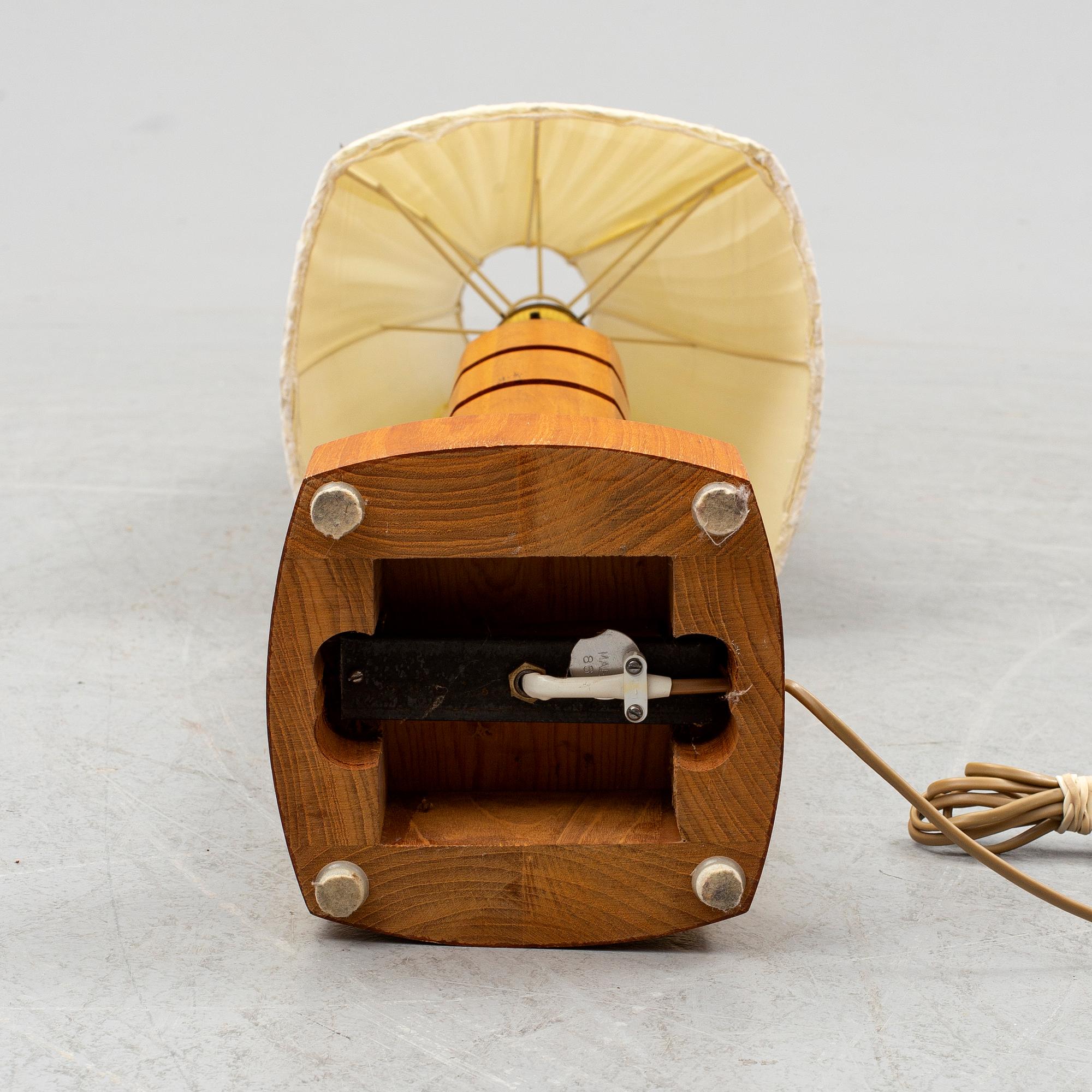 A Möllers Armatur Teak and brass lamp, Eskilstuna, mid 20th Century.