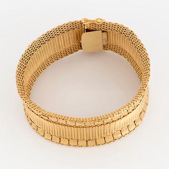 ARMBAND, 18K guld, vävt mönster med rektangulära guldplattor på kanterna.