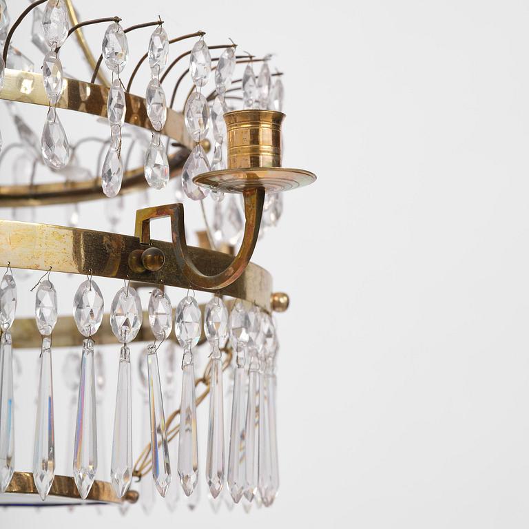 A late-Gustavian five-light gilt brass and cut glass chandelier, Stockholm, late 18th century.