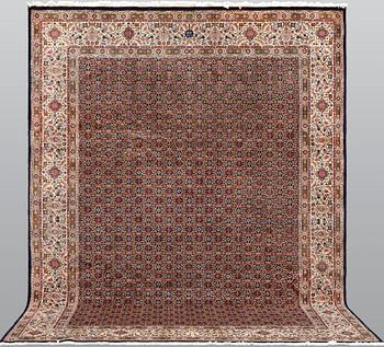 A Moud part silk carpet, signed, 335 x 250 cm.