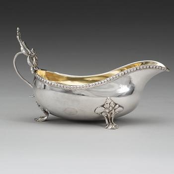 A Swedish 18th century parcel-gilt cream-jug, makers mark of Lars Hessling, Linköping 1778.