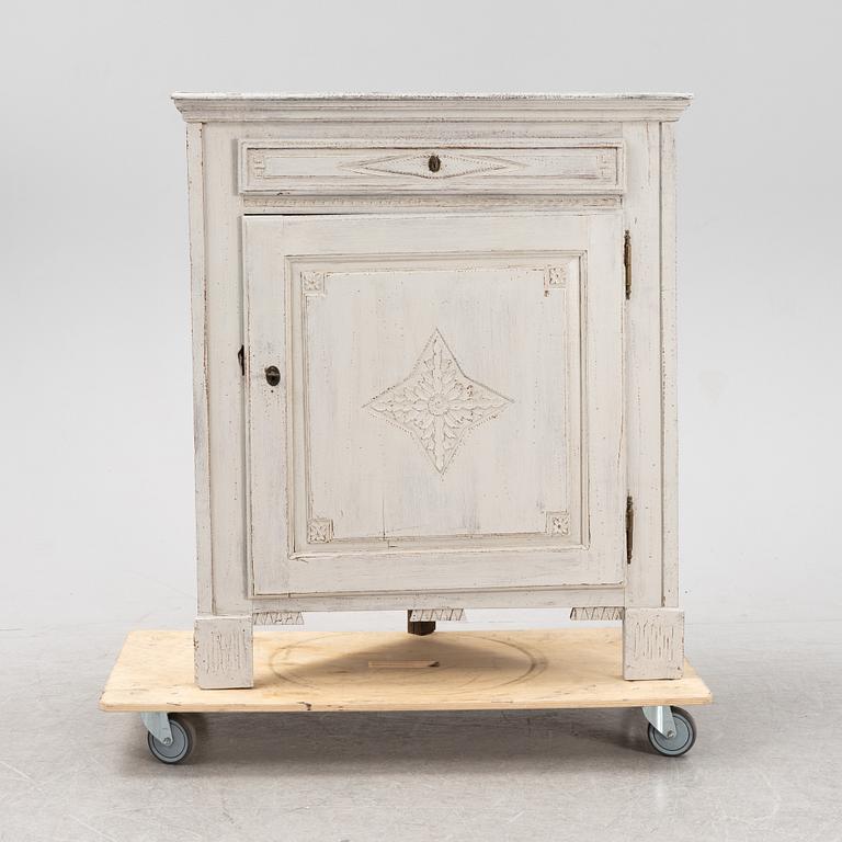 A 19th Century painted corner cabinet.