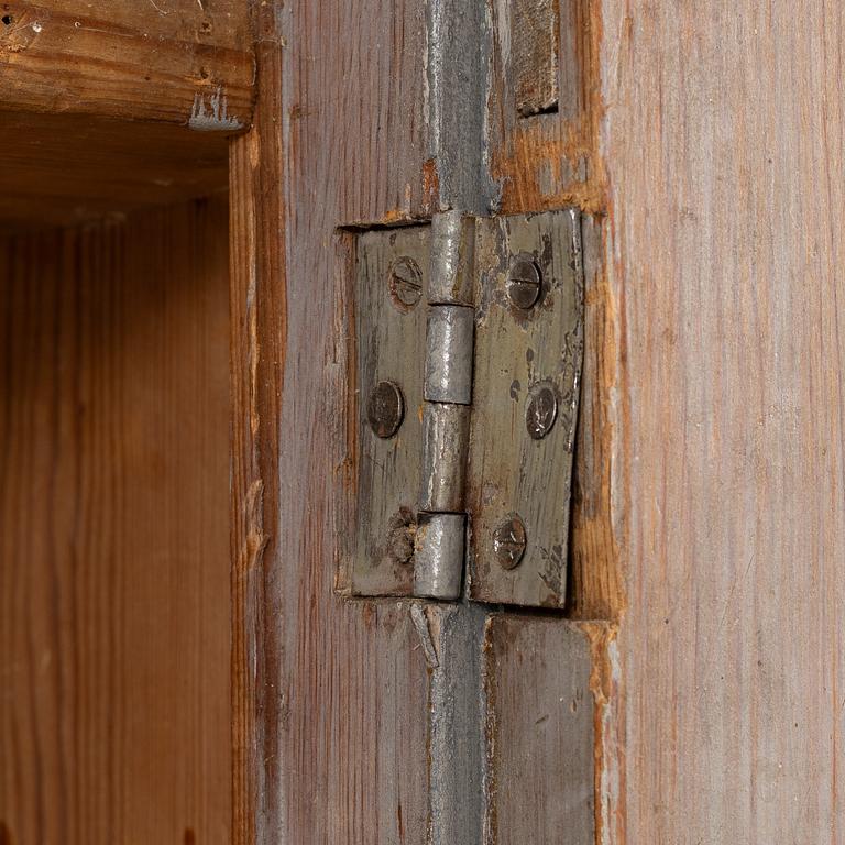 A Gustavian cupboard, circa 1800.