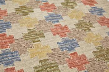 Swedish design, a carpet, knotted pile in relief, ca 178,5-179,5 x 137-140,5 cm, signed and dated at the back: SKLH 1944.