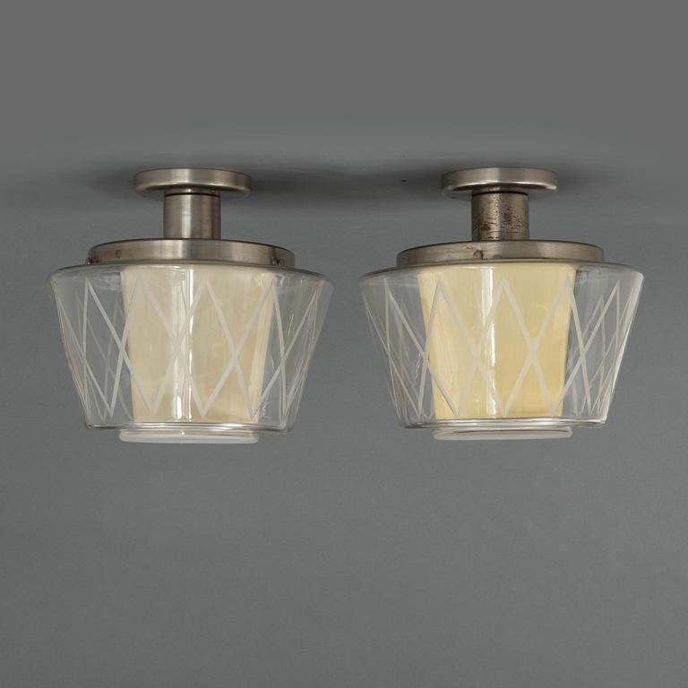 Harald Notini, taklampor, ett par, modell "11197", Arvid Böhlmarks Lampfabrik, Stockholm, 1940-50-tal.