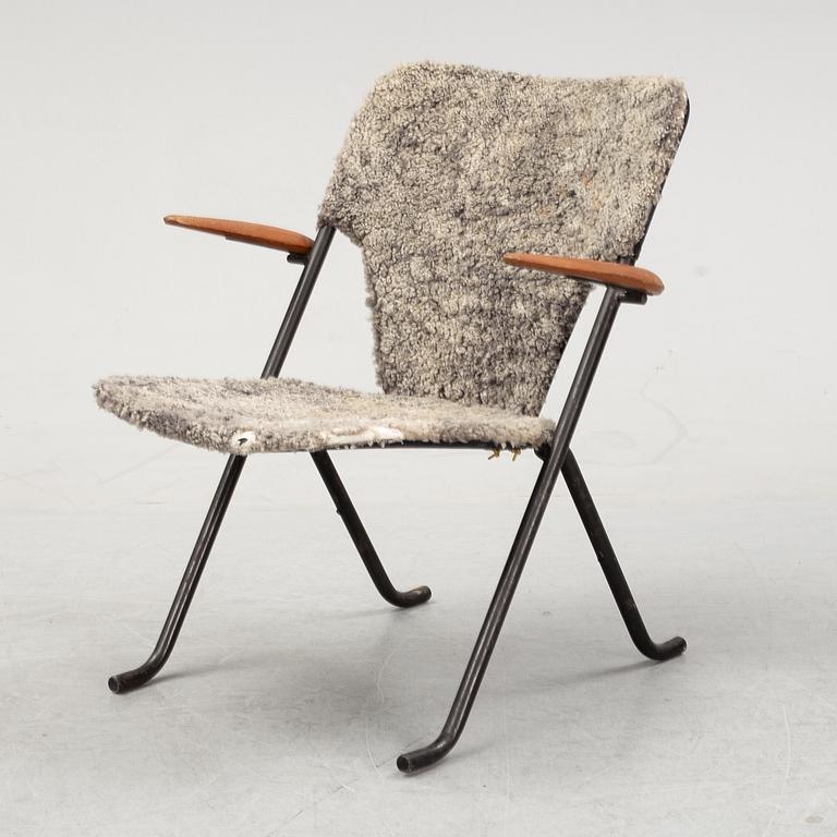 A 'Gåsen' armchair, Herman Persson Järn- & Trämanufaktur, Bjärnum, 1950's.