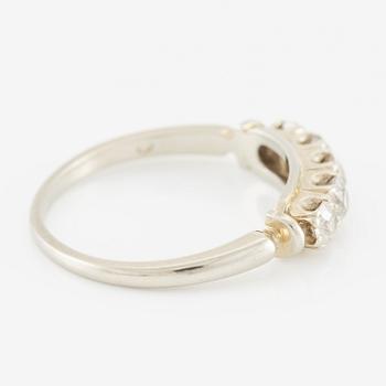 Ring in 18K white gold set with five old-cut diamonds.